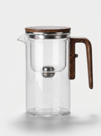KINN Pure Ritual borosilicate glass tea infuser pot filled with brewed tea