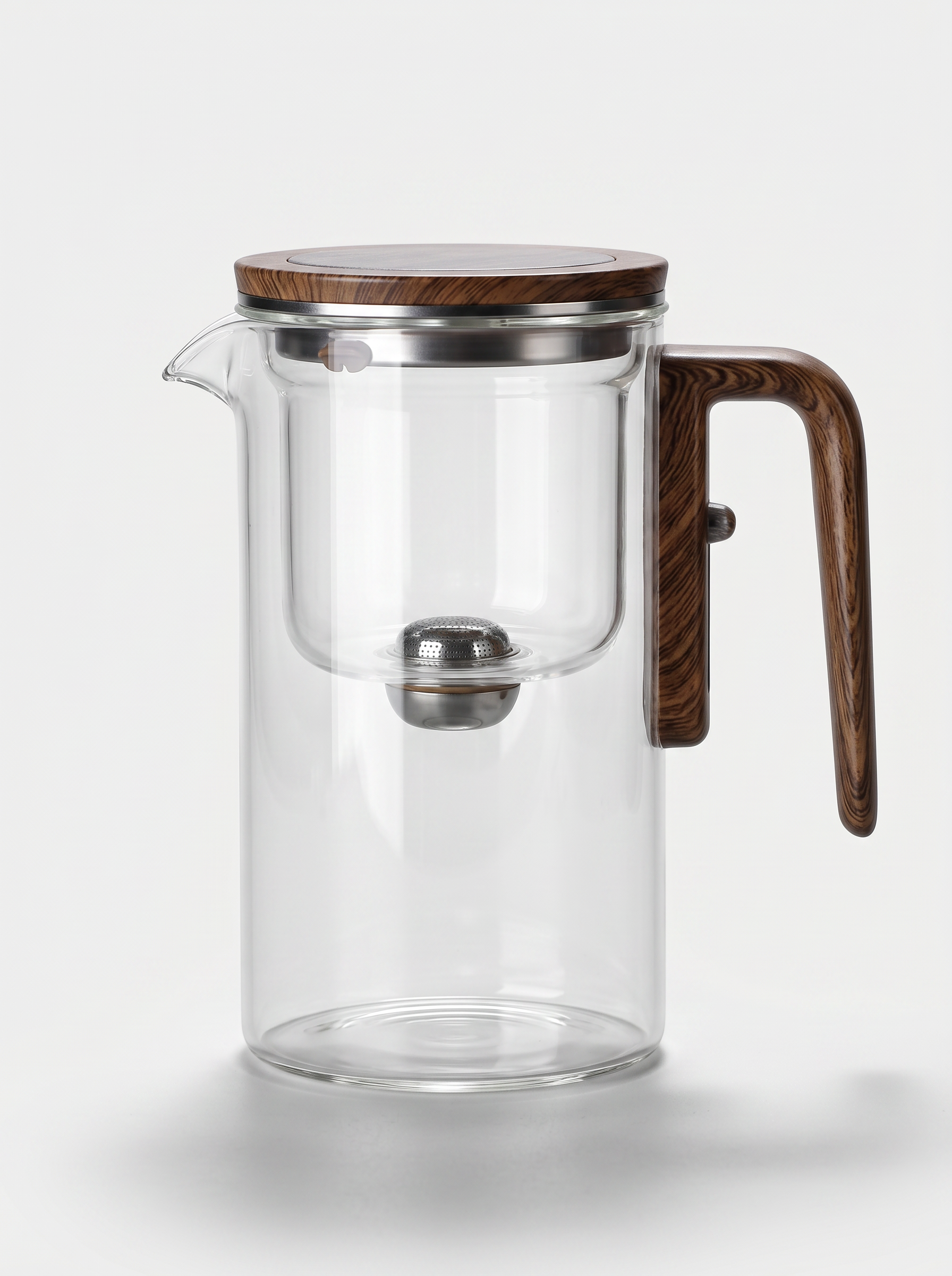 KINN Pure Ritual borosilicate glass tea infuser pot filled with brewed tea