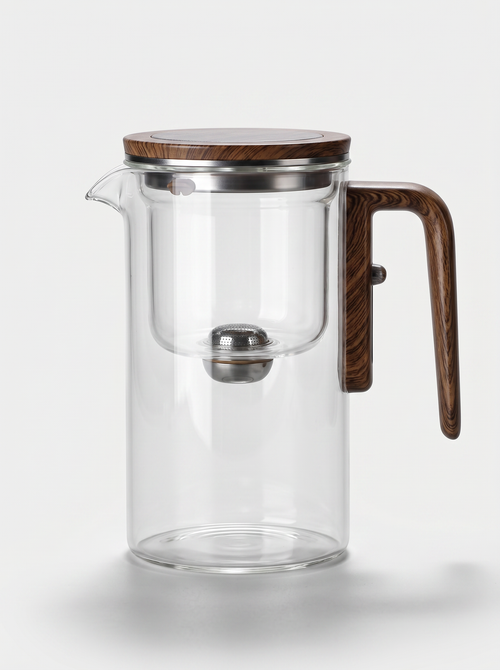 KINN Pure Ritual borosilicate glass tea infuser pot filled with brewed tea